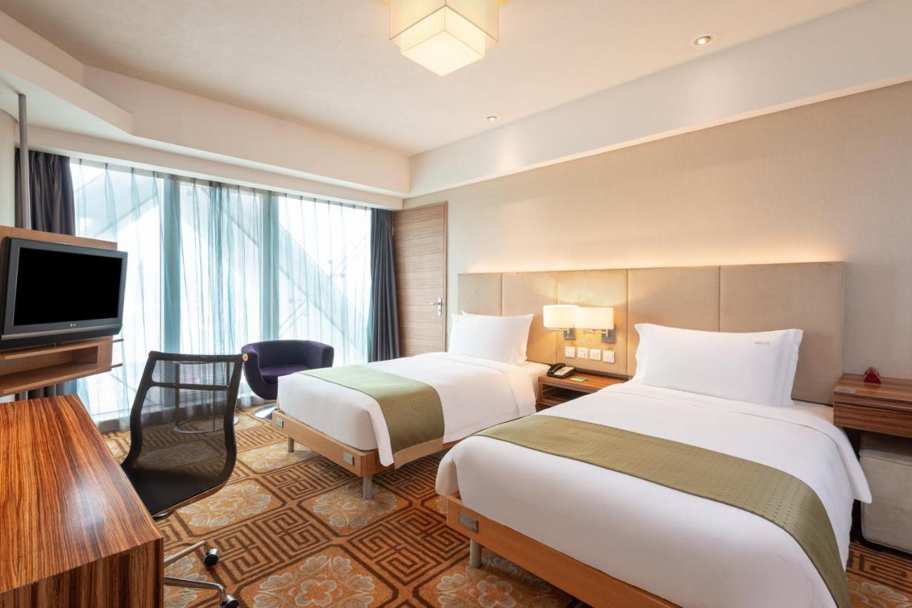Holiday Inn Binhai Tiencsin Szoba fotó